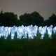 Illustration for article titled Horde of 100 radiation suit-clad specters invades German music festival